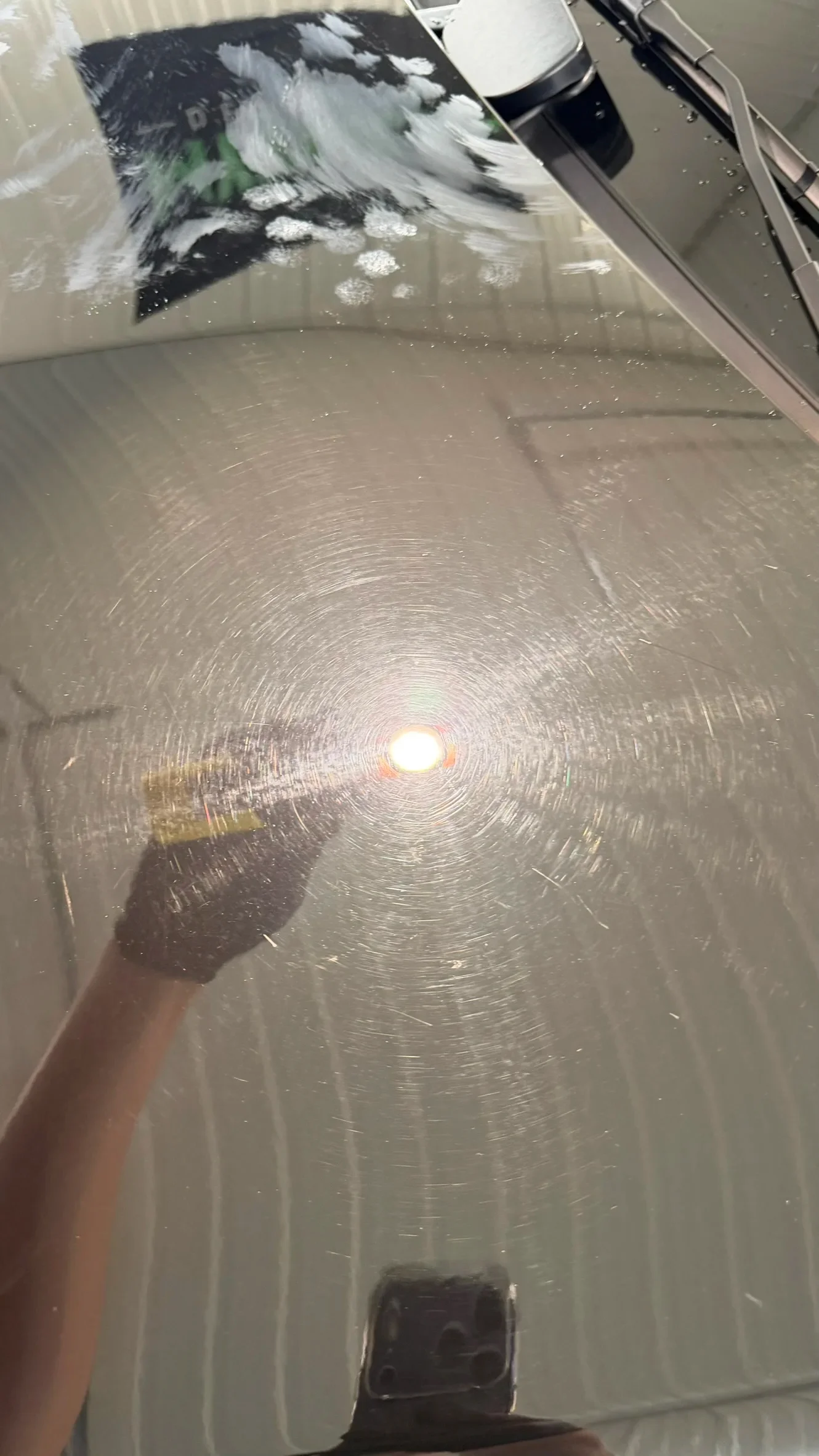 Before paint correction – swirl marks under inspection light