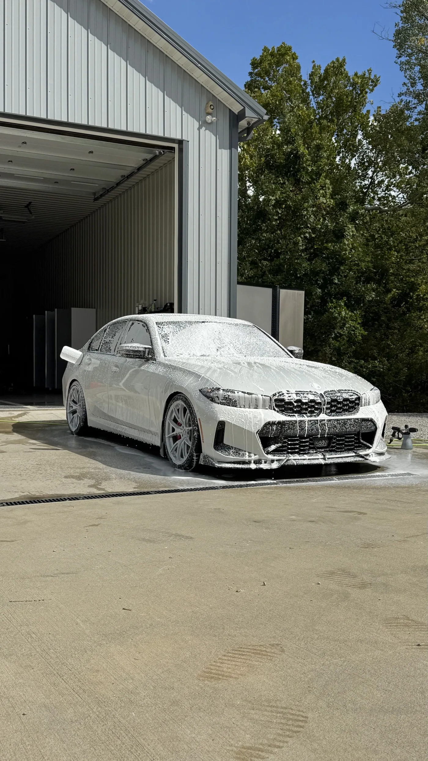 BMW 3 Series foam wash prep at Mythical Detailing shop Kansas City