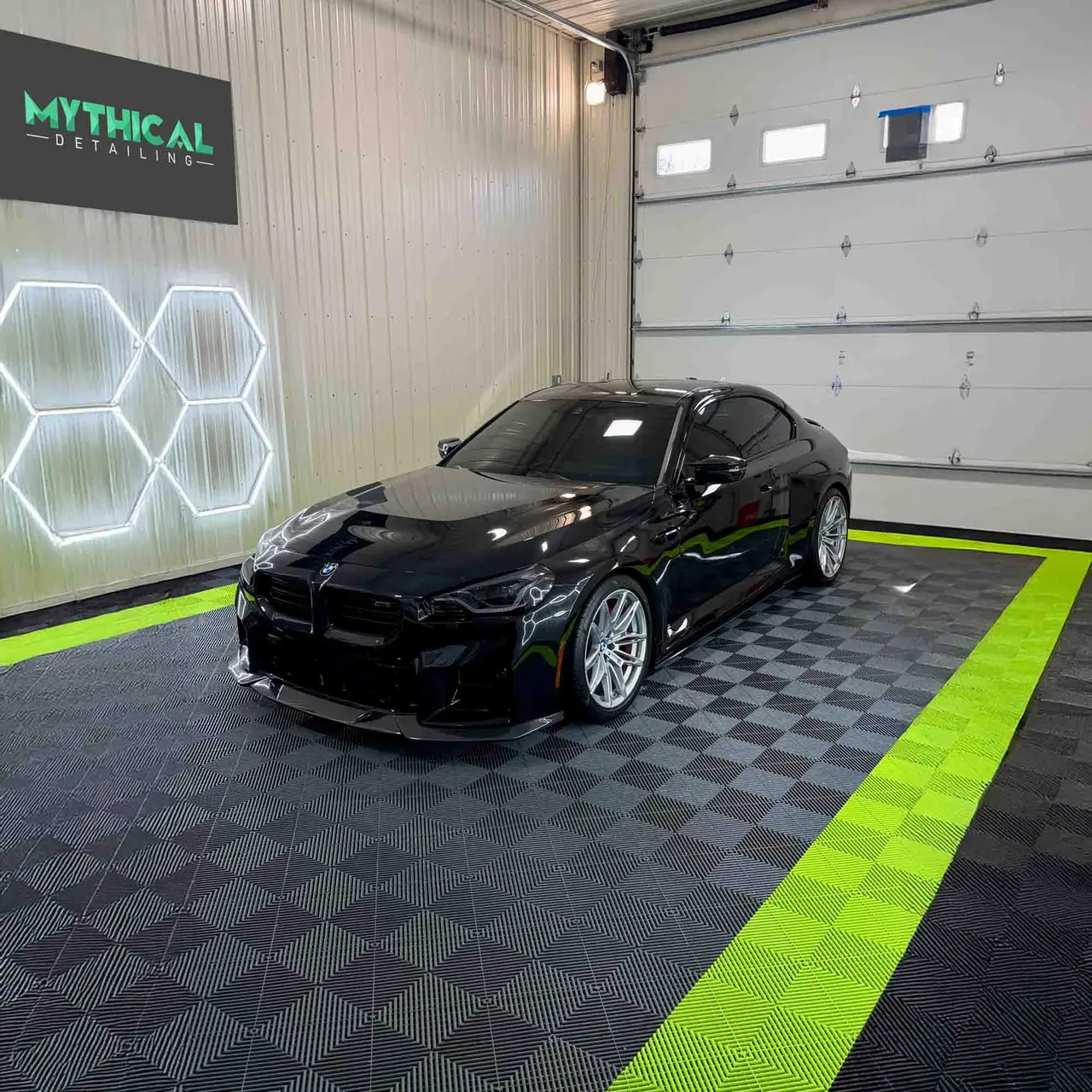 Black BMW coupe ceramic coating at Mythical Detailing Kansas City